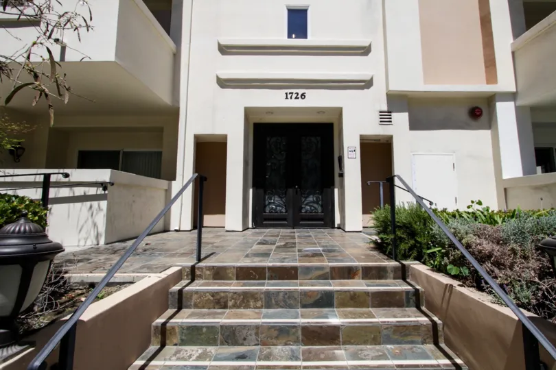 The stairs leading up to 1726 Bentley Regency in Westwood