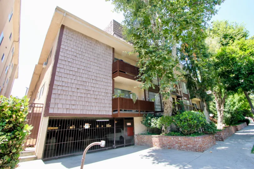 Discover this best priced condo in Westwood. Situated in a small intimate building on a quiet tree-lined street. This unit only shares one common wall features a charming fireplace and hardwood floors throughout, a private balcony and large walk-in closet