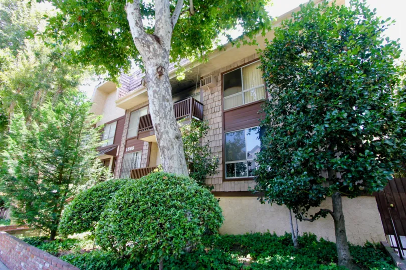THE HOUSE IS 1865 GREENFIELD IT IS VERY NICE AND WONDERFUL AND IN FRONT OF TREES IS NICE