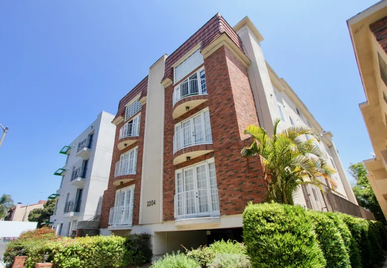 the house very beauty and costly apartments and greens plant