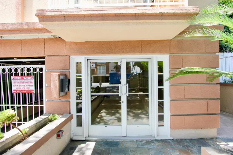 BENLEY PALACE IS IN THE CITY OF WESTWOOD AND IN THE STATE OF CALIFORNIA. THERE IS A GLASS DOOR