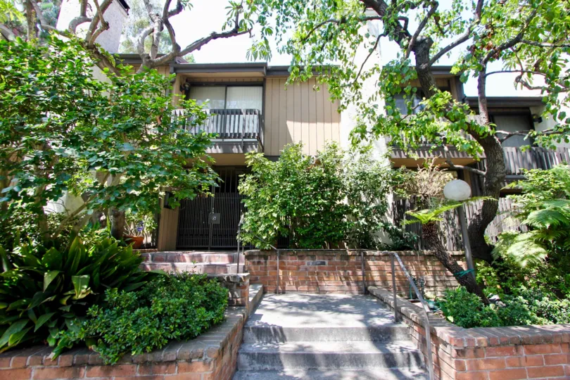 A BENTLEY VILLAGE IS A LARGE BUILDING AND GOOD COURTYARD.