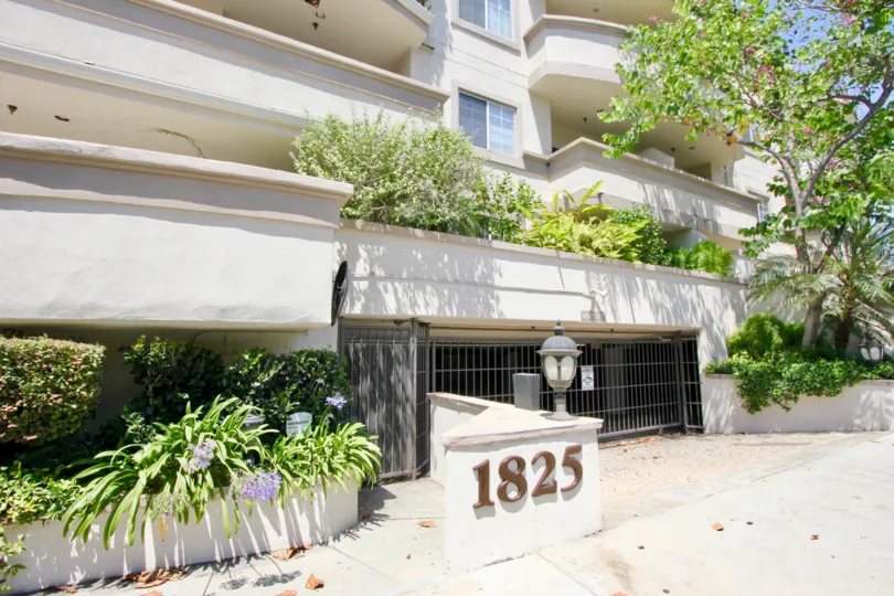the front door of a building in the Century Glen Townhomes