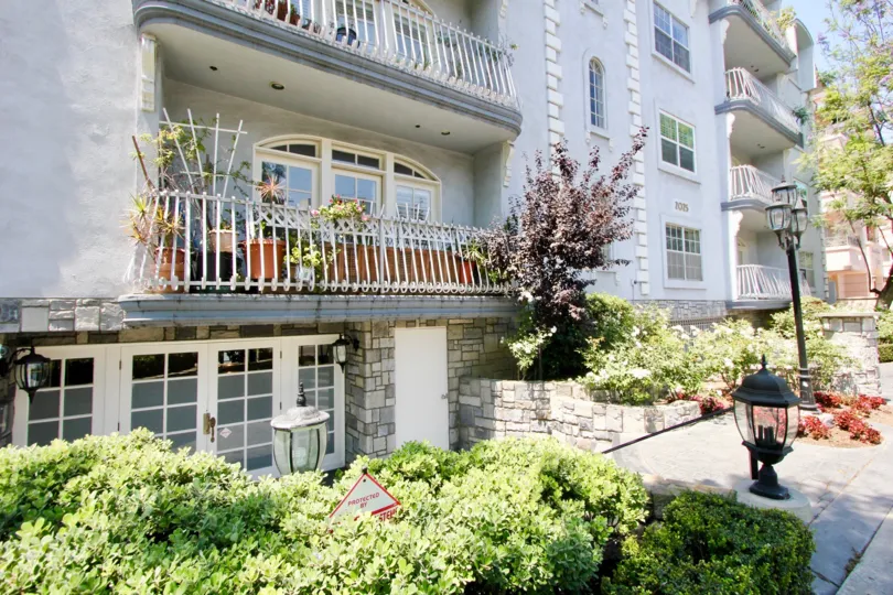Chateau Glen, westwood, California is A beautiful well construct building which have elegant colour and shiny bright glass windows. Lots of green trees enhance its beauty. A sunny bright day give it an amazing look.