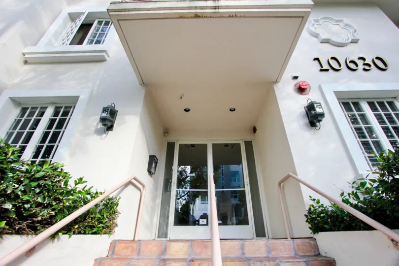 glass door at entry of big building in Eastborne Regency, westwood