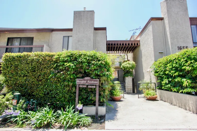 Brown Walls and green flowers, Beauty and landmark of Greenfield Townhomes, Westwood, california