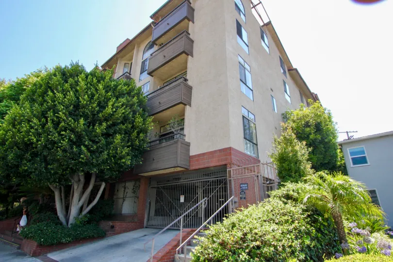 Image in Spring or Summer of a corner of a five story-building in Holman Manner in Westwood, California