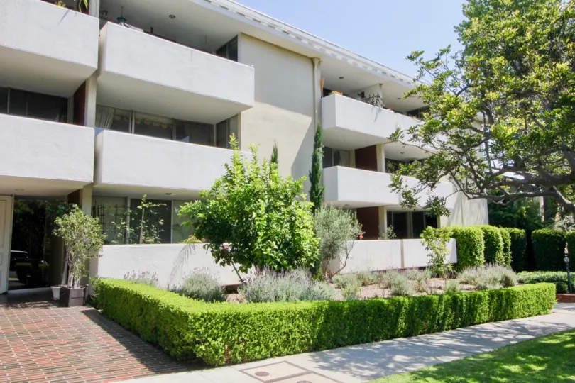 A beautiful building in kinnard westwood and the front view is very beautiful plants and trees