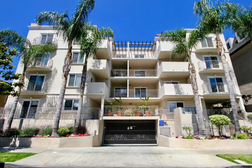 A SUNNY DAY IN THE MALCOLM AVENU CONDOS WITH VARIOUS APARTMENT