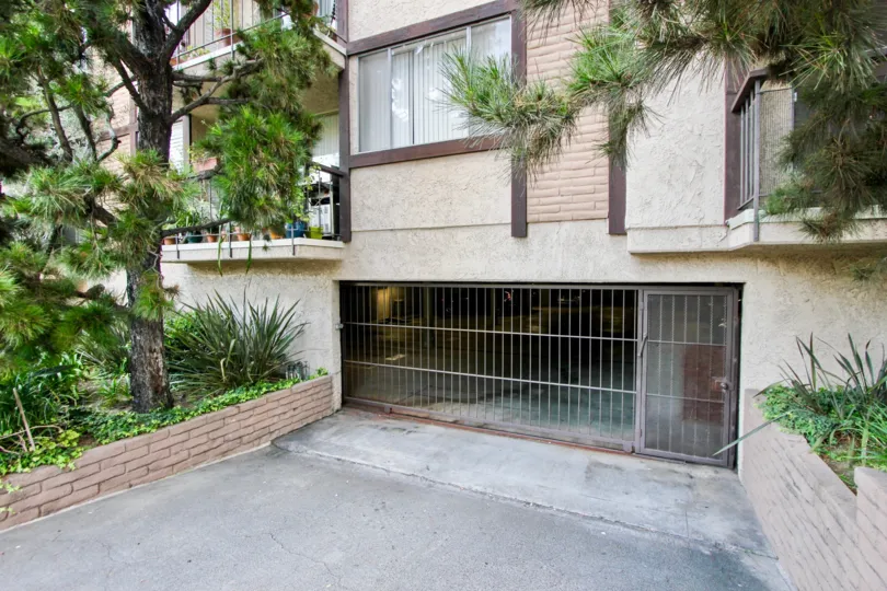 A house surrounded by trees in Park Almayo with underground garage visible