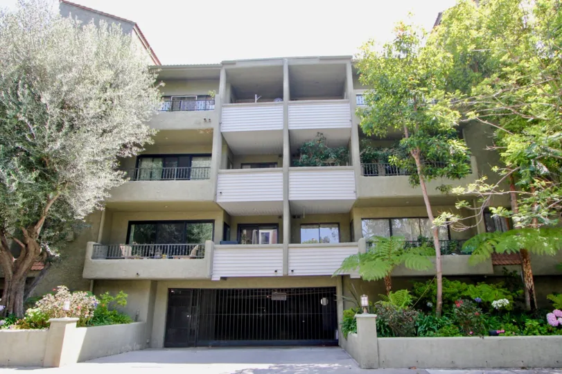 The building front side in park bentley of westwood that should has some trees.