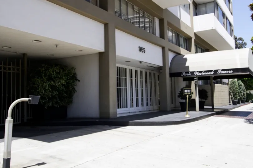 The sidewalk in front of Park Westwood Towers