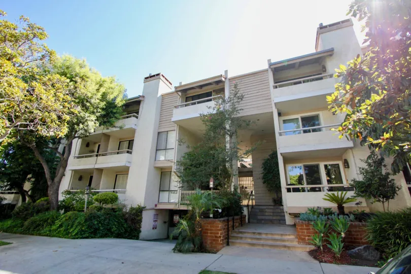 A HOUSE WITH THREE FLOORS AND A BALCONY ALSO AVAILABLE LOOKING WITH MILD YELLOW COLOUR AT SUNSHINE SIGHT