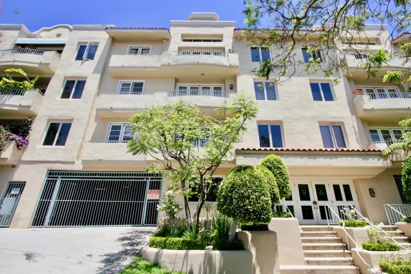 Sunny weather and large building with glass windows in The Beverly Westwood