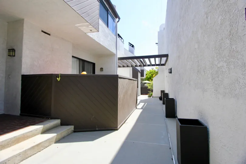 A lovely day day at The Village Townhouses, a residential building with a clean look.