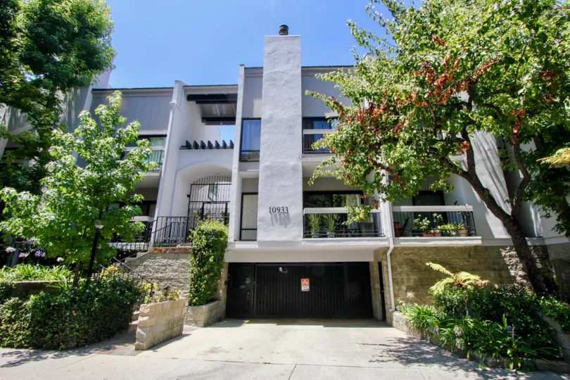 Grey colored walls with green surroundings of Westwood Center Townhomes, Westwood, California