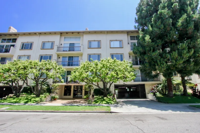 Sunny weather and large building in Westwood Center Townhomes in California
