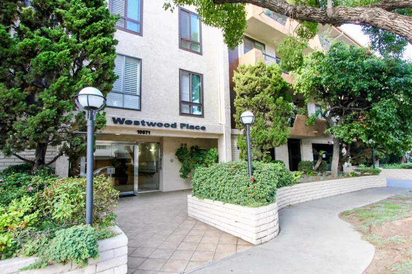 Entrance and nice floral styled surroundings of Westwood Place, Westwood, California