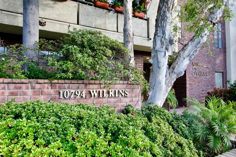 A view of the frontside entrace to Westwood Terrace with the address listed