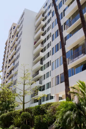 The hedges around the Villas at Kentwood building