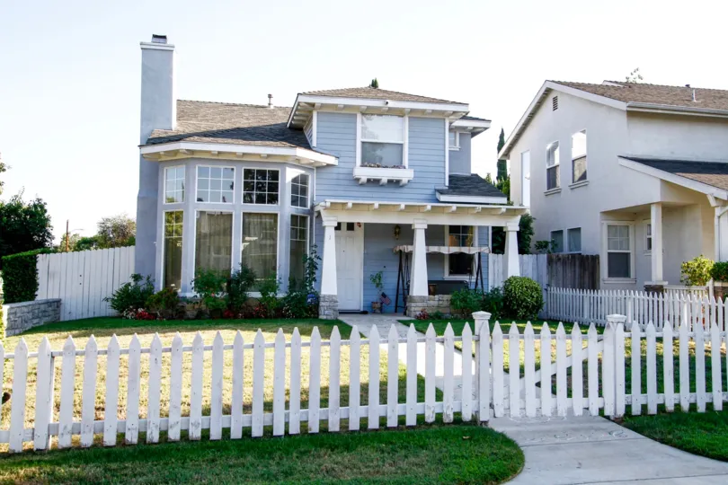 The sidewalk leading up to Canoga Park Picket Fences