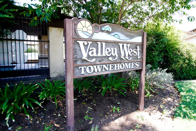 The welcoming sign into Valley West Townhomes