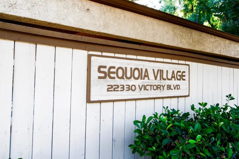 The welcoming sign into Sequoia Village in CA California