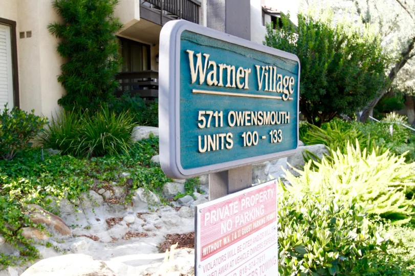 The Warner Village sign