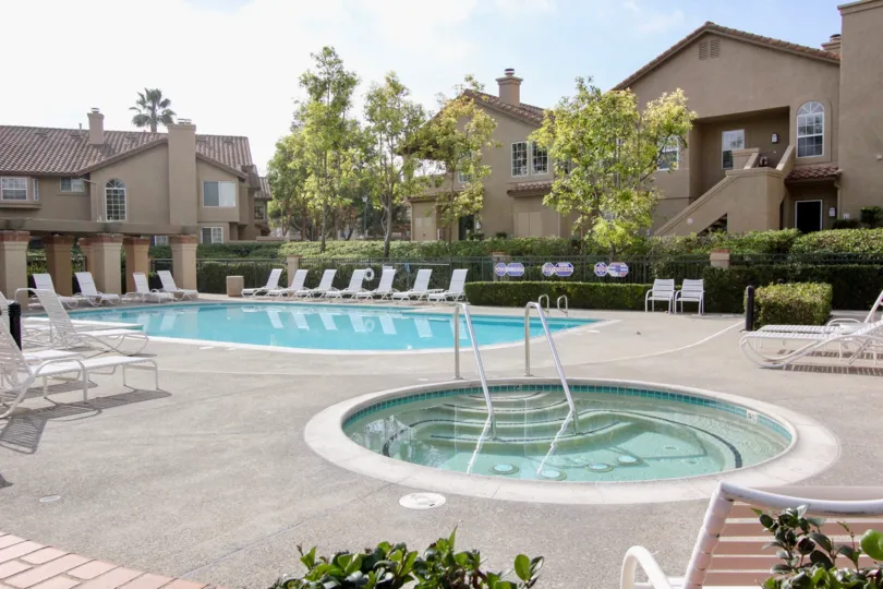 Inside the Apartment in Calabria has Adult Swimming pool and Children's Swimming pool with chairs