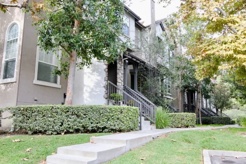 Unique stone columns and the lush yard make this Camden Park walkup stand out from the crowd.
