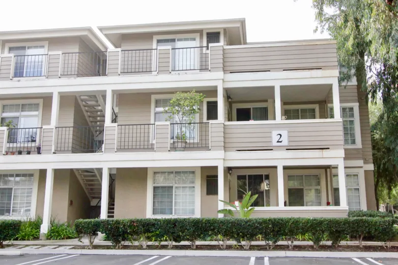 Apartments in Canyon Villas mentioned with number 2 on wall in Balcony with flower pots