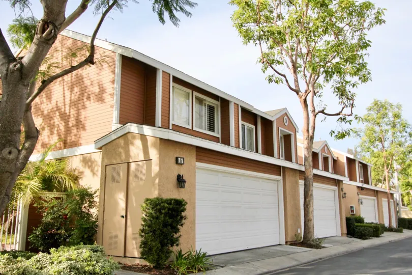 Khaki and terracota colored townhomes stand side by side in Glenwood Park.