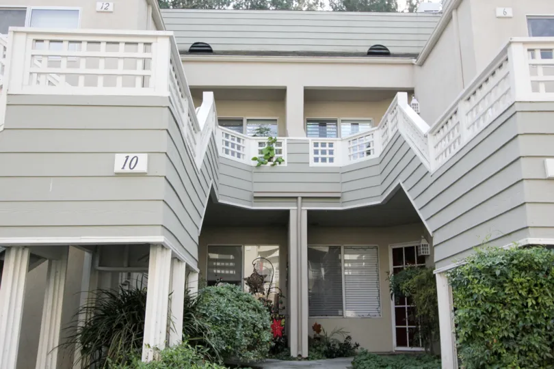THE 12, 6, 10 FLATS IN THE GLENWOOD VILLAGE WITH THE PLANTS, TREES, BALCONIS