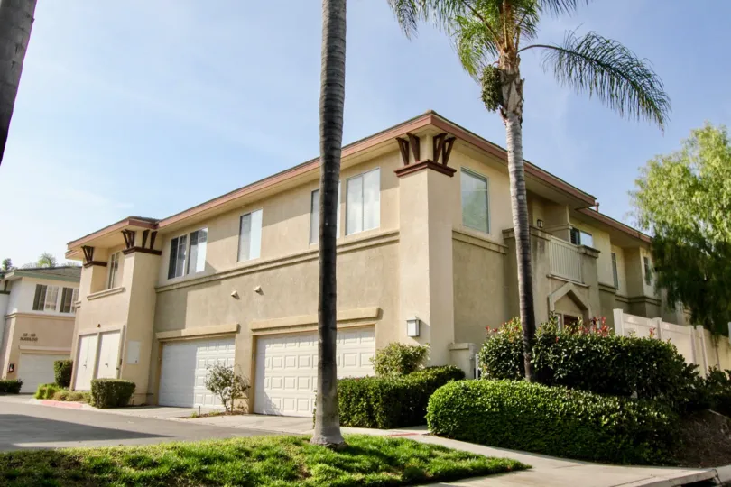 White sand home with palm trees in Oreleans, Aliso Viejo California