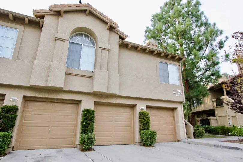 Comfort, style, and space at Seacove Place with garages and lovely trees