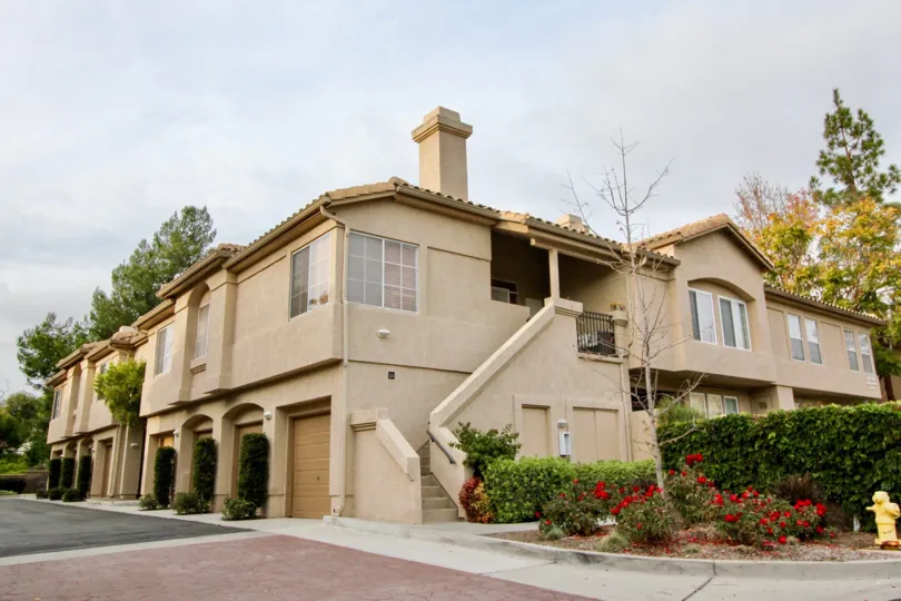 THE APARTMENT IN THE SEACOVE PLACE WITH THE ROSE PLANTS, UPSTAIRS, TREES, SHUTTER
