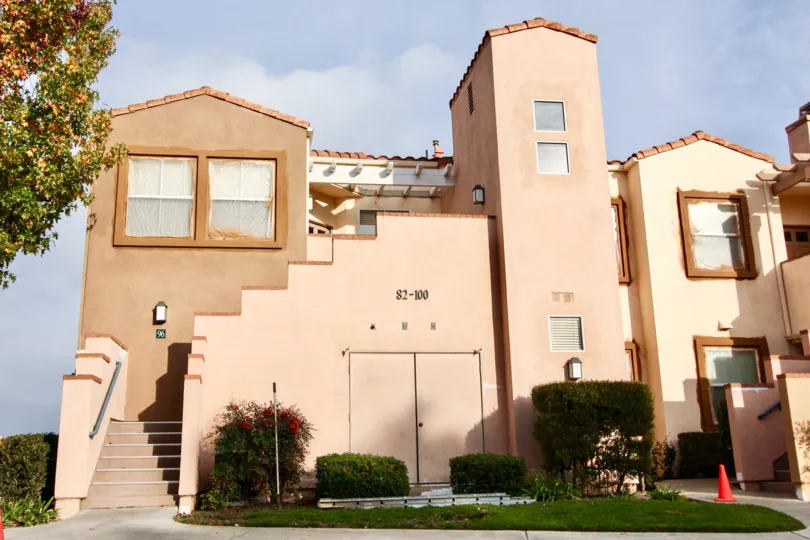 A multi level Spanish style building houses several units in Seacove Villas.