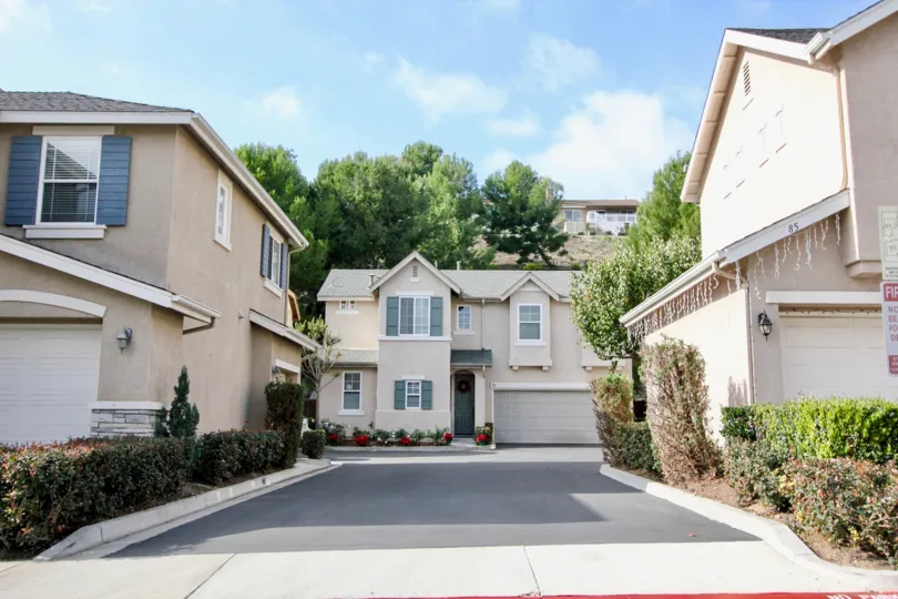 A long and narrow driveway leading through town homes in the Soleil community at Aliso Viejo CA