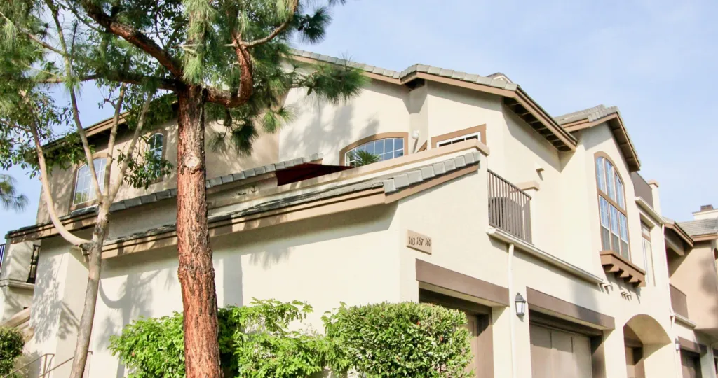 THE HOUSE IN THE ST, TROPEZ WITH THE TREES, PLANTS, WINDOWS, WOODEN DOOR