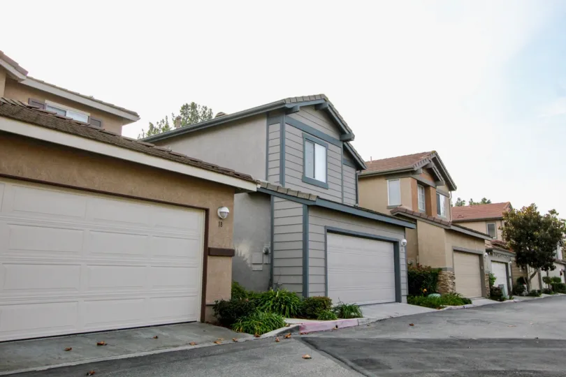 Attached garages available at The Pointe community in Aliso Viejo, CA on a sunny day