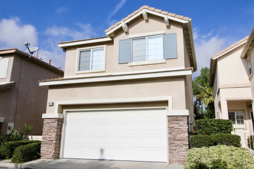 House with windows and a garage in the Victoria Community in Aliso Viejo, CA.