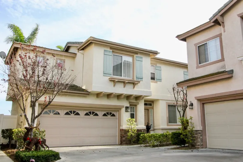 THE BUNGALOW IN THE VISTA HEIGHTS WITH THE SHUTTER, PLANTS, TREES, DISH ANTENNA