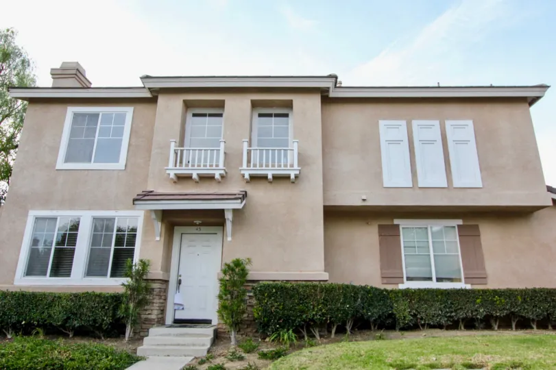 A beautiful two story home on a sunny day in Vistas Plaza in Aliso Viejo, California.
