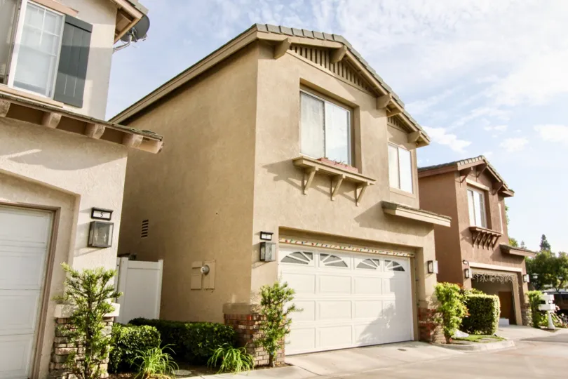 A two floor home with a garage located in sunny Aliso Viejo, California.