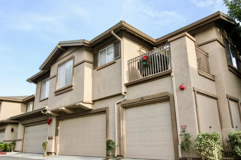 Corner side view with garage gate and veranda of Vistas Above Wood Canyon community, Aliso Viejo, CA