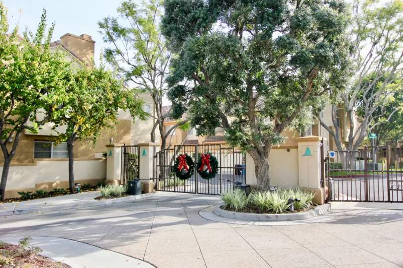 Two large Christmas reefs on the entrance gates of Windsong in Aliso Viejo CA