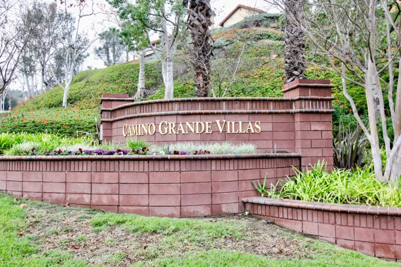 THIS IMAGE SHOWS THE GARDEN WHICH IS SITUATED IN THE COMMUNITY OF CAMINO GRANDE VILLAS THAT HAS LOT OF TREES AND PLANTS WITH FLOWERS