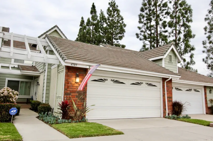 THE 4585 APARTMENT IN THE CANYON TERRACE TOWNHOMES WITH THE SHUTTERS, LAWN, FLAG