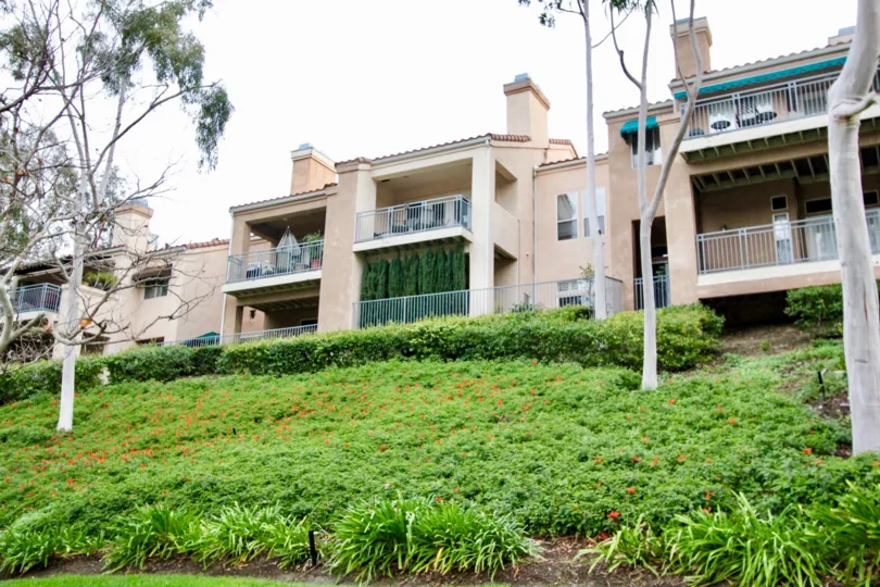 Houses at the Firenze in Anaheim Hills with trees and lawns
