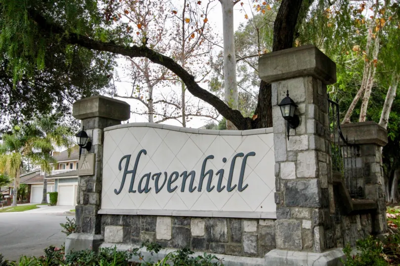 THE HOUSE IN THE HAVENHILL WITH HAVENHILL WALL, PLANTS, TREES